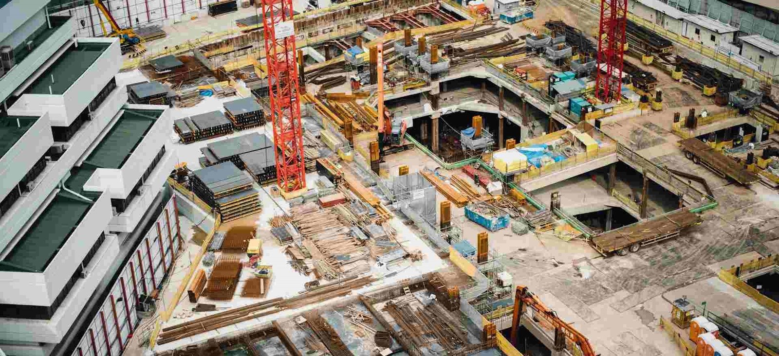 Engineering, Procurement, and Construction (EPC) project planning with engineers reviewing industrial plant designs.